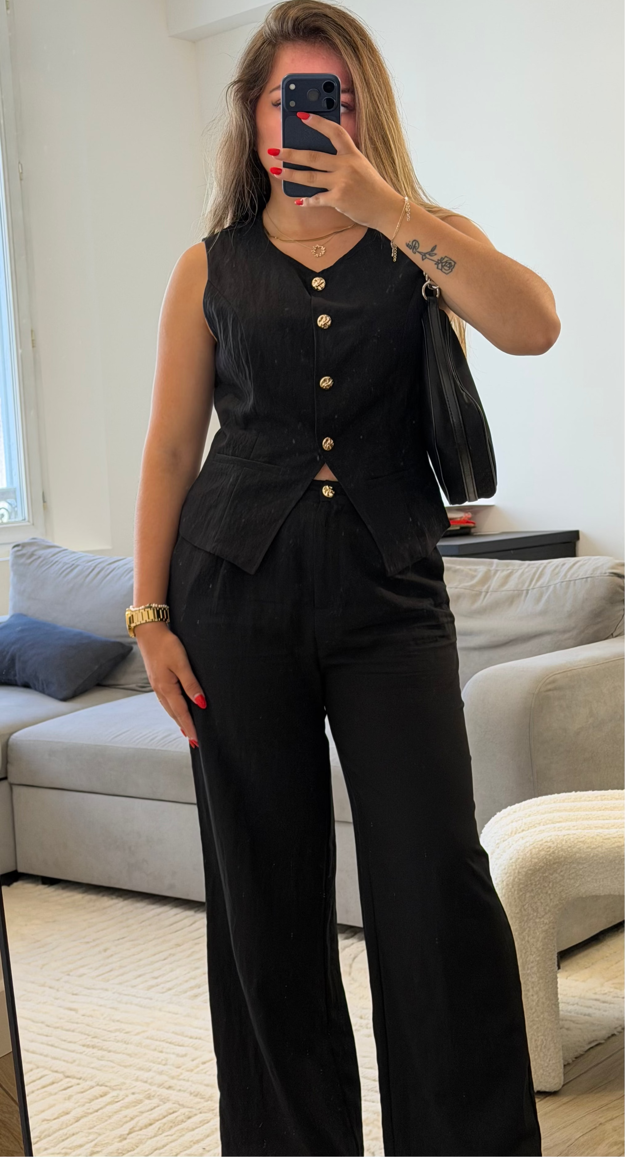 Ensemble Elise avec pantalon fluide et gilet sans manches en coton pour femme noir.