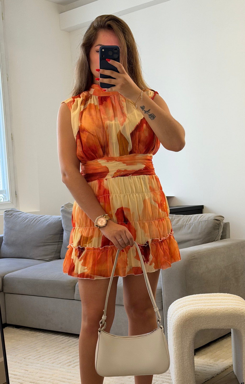 Détail de l'imprimé orange et terracotta de la Robe Ambre.