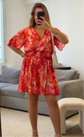Robe Manuela courte fleurie avec décolleté cache-cœur pour femme.